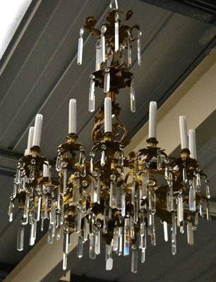 Lot 416 - A Gilt Metal Fourteen Light Chandelier, 19th century, with leaf cast sockets and drip pans...
