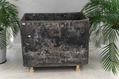 Lot 419 - A George III Lead Cistern, dated 1767, of rectangular form cast with elephant crest, scrolls...