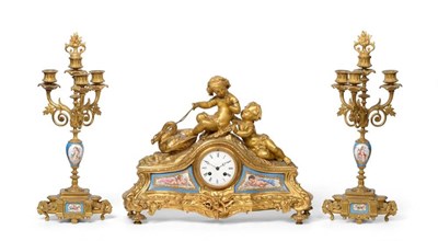 Lot 425 - An Ormolu and Porcelain Mounted Striking Mantel Clock with Garniture, circa 1890, surmounted by...