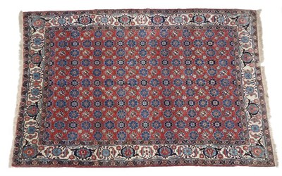 Lot 447 - Veramin Carpet  Central Iran, circa 1930 The brick red field of MIna Khani design enclosed by ivory