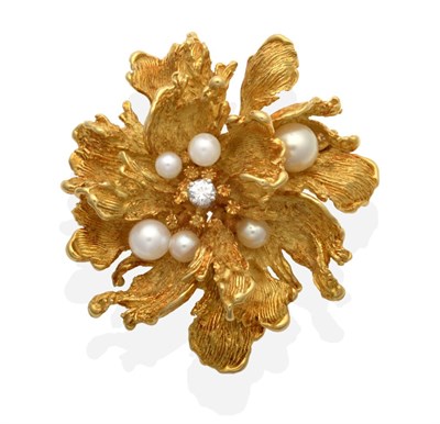 Lot 420 - A Pearl and Diamond Floral Brooch, a round brilliant cut diamond within a cluster of vari-sized...