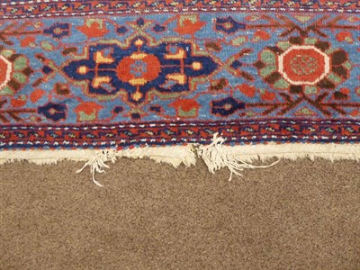 Lot 452 - Sultanabad Carpet West Iran, circa 1900 The deep indigo Herati field enclosed by sky blue...