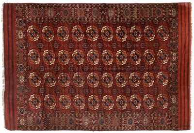 Lot 453 - Tekke Turkmen Main Carpet Emirate of Bukhara, circa 1890 The deep madder field with four columns of