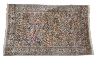 Lot 454 - Kirman Carpet South East Iran, circa 1930 The ivory field depicting a one-way design of...