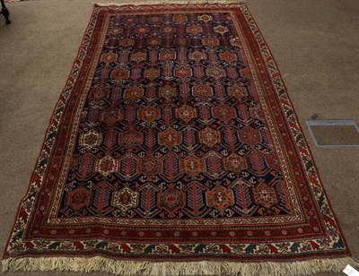 Lot 462 - Fine Afshar Rug South West Iran, 19th century The indigo field with columns of polychrome...