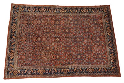 Lot 468 - Mahal Carpet  West Iran, circa 1930 The soft terracotta field with an all over Herati design...