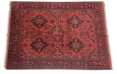 Lot 473 - Good Turkmen Carpet North West Afghanistan, modern The brick red field with four large...