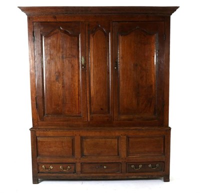 Lot 480 - A George III Oak Press Cupboard, 3rd quarter 18th century, the bold cornice above two fielded panel