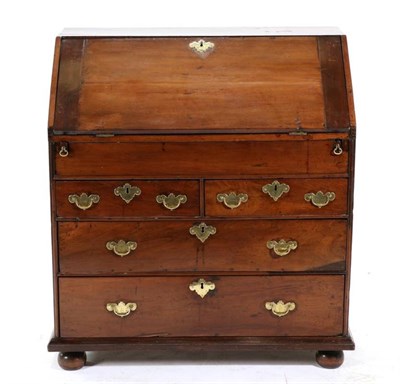 Lot 481 - An Early 18th Century Yewwood and Pine Lined Bureau, the fall front enclosing a fitted interior...