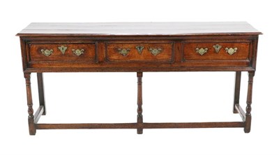 Lot 482 - A Joined Oak Dresser, 2nd quarter 18th century, the three plank top with moulded edge above...