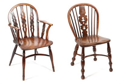 Lot 485 - A Thames Valley Yewwood Windsor Armchair, 2nd quarter 19th century, the three pierced splats...