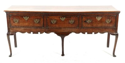 Lot 486 - An Oak Low Dresser, North-West/West Midlands, the later top above three deep drawers and an...