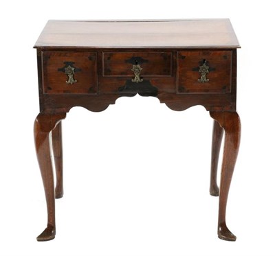 Lot 488 - A Mid 18th Century Oak and Mahogany Crossbanded Dressing Table, with three frieze drawers above...
