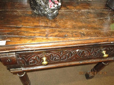 Lot 490 - A 17th Century Oak Dresser, with two carved drawers, on turned baluster and block forelegs,...