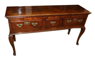 Lot 498 - A George III Fruitwood Low Dresser, 3rd quarter 18th century, the moulded top above two long...