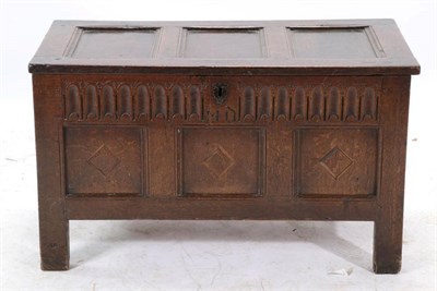 Lot 499 - A 17th Century Joined Oak Chest, the hinged lid with three fielded panels above a nulled frieze...