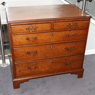 Lot 510 - A George III Oak and Mahogany Crossbanded Straight Front Chest of Drawers, late 18th century,...