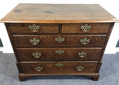 Lot 511 - A George III Oak Straight Front Chest of Drawers, 3rd quarter 18th century, the moulded top...