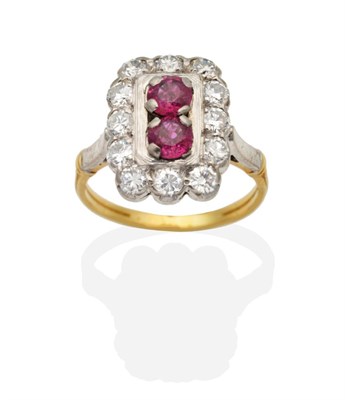 Lot 454 - A Ruby and Diamond Cluster Ring, two round cut rubies within a rectangular frame of round brilliant