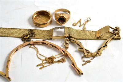 Lot 3 - A mixed lot of 9ct gold items including, a lady's wristwatch bracelet, ring, lady's watch case, etc