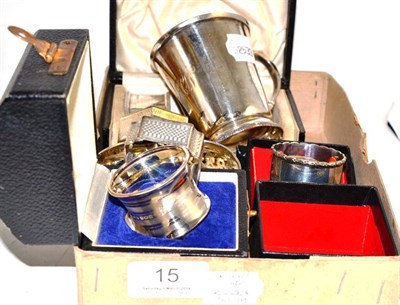 Lot 15 - A silver mug, eight silver napkin rings, quantity of silver plate and a carnival glass bowl