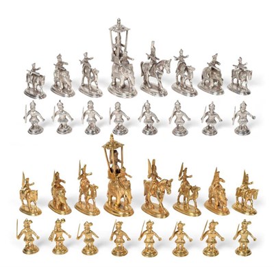 Lot 512 - An Indian Silver and Silver Gilt Figural Chess Set, 20th century, unmarked, the kings as...