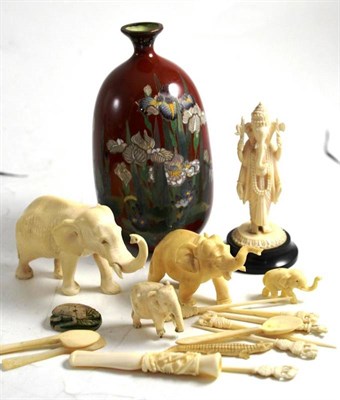 Lot 27 - A collection of carved ivory, circa 1930 and a Japanese cloisonne vase