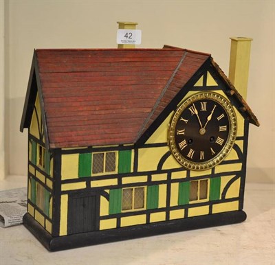 Lot 42 - A striking novelty house clock
