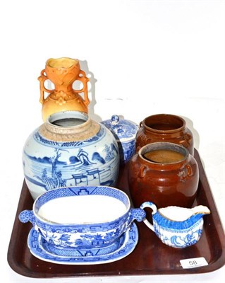Lot 58 - A Chinese blue and white ginger jar, two treacle glaze jars, three pieces of blue and white pottery