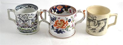 Lot 93 - A 'Tykes Motto' earthenware mug, a 'God Speed the Plough' twin handled mug and an ironstone mug (3)