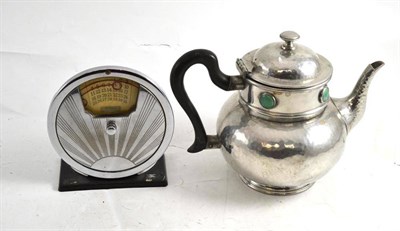 Lot 110 - A calendar desk piece and a pewter teapot with green cartouches