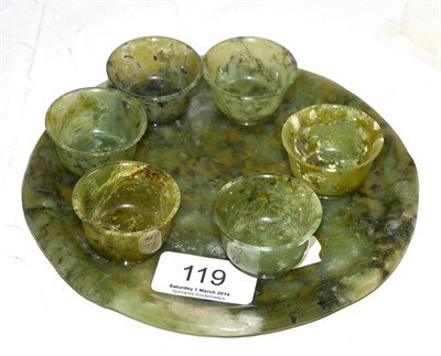 Lot 119 - A nephrite circular tray and six tea bowls
