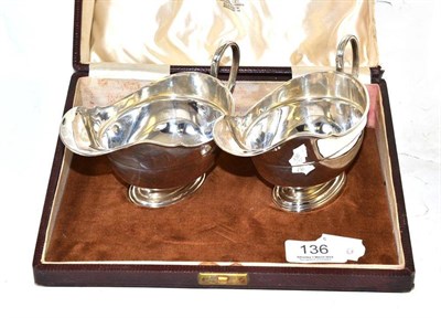 Lot 136 - A pair of silver sauce boats in the Neo-Classical style, Birmingham 1936, cased