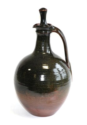 Lot 606 - Joe (Joseph) Finch (British, b.1947): A Stoneware Bottle and Stopper, tenmoku glaze, impressed...