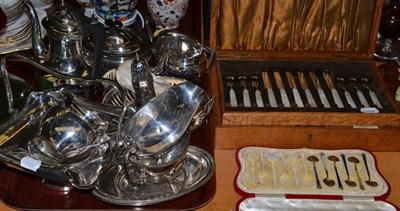 Lot 168 - A quantity of silver plate, cased set of silver bladed knives and forks and six enamel teaspoons