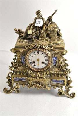 Lot 188 - A gilt metal striking mantel clock