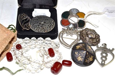 Lot 196 - Assorted silver and white metal brooches including a hardstone set brooch, a tortoiseshell...