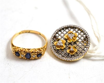 Lot 197 - An 18ct gold sapphire and diamond ring and an 18ct gold diamond set brooch