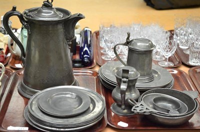 Lot 241 - Two trays of pewter including a flagon, wine tasters, assorted side plates