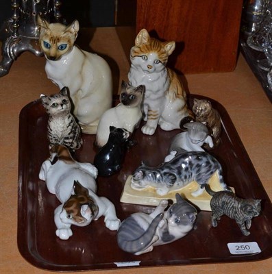 Lot 250 - Tray of assorted cat ornaments including examples by Royal Worcester, Royal Copenhagen, Lladro,...