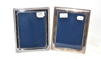 Lot 276 - Silver photograph frame by Henry Hutton & Co, Sheffield 1988, 22.5cm by 17cm and another by...