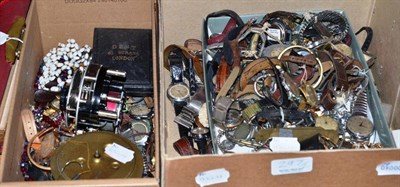 Lot 297 - A quantity of lady's and gents wristwatches, in two boxes