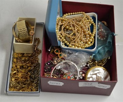 Lot 302 - A collection of costume jewellery including a 9ct gold bangle, locket and chain, bracelet, 9ct...