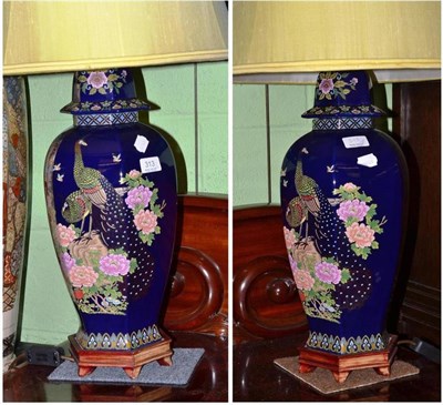 Lot 313 - Pair of Chinese lamps with shades