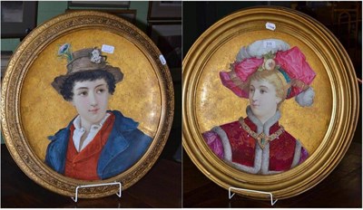 Lot 315 - A pair of Continental transfer and hand painted circular plaques contained within gilt frames