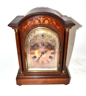 Lot 320 - An inlaid chiming table clock