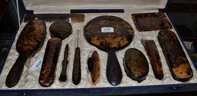 Lot 336 - Cased faux tortoiseshell dressing set