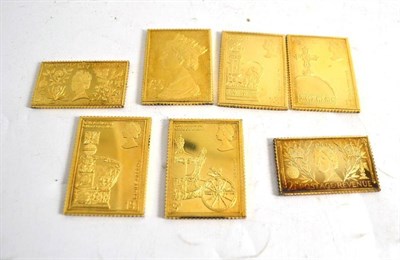 Lot 337 - Seven silver gilt stamps