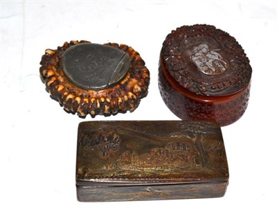 Lot 354 - Carved snuff box the lid decorated with a landscape, an antler snuff box and a resin snuff box...