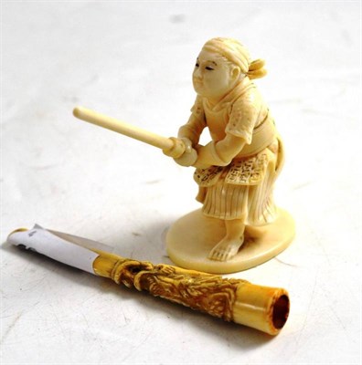 Lot 364 - A Japanese carved ivory figure of a Samurai signed to the lacquer panel and a Chinese cheroot...